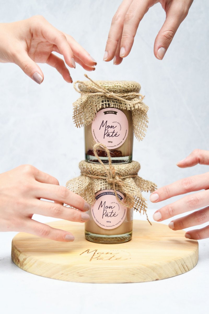 Hands around two jars