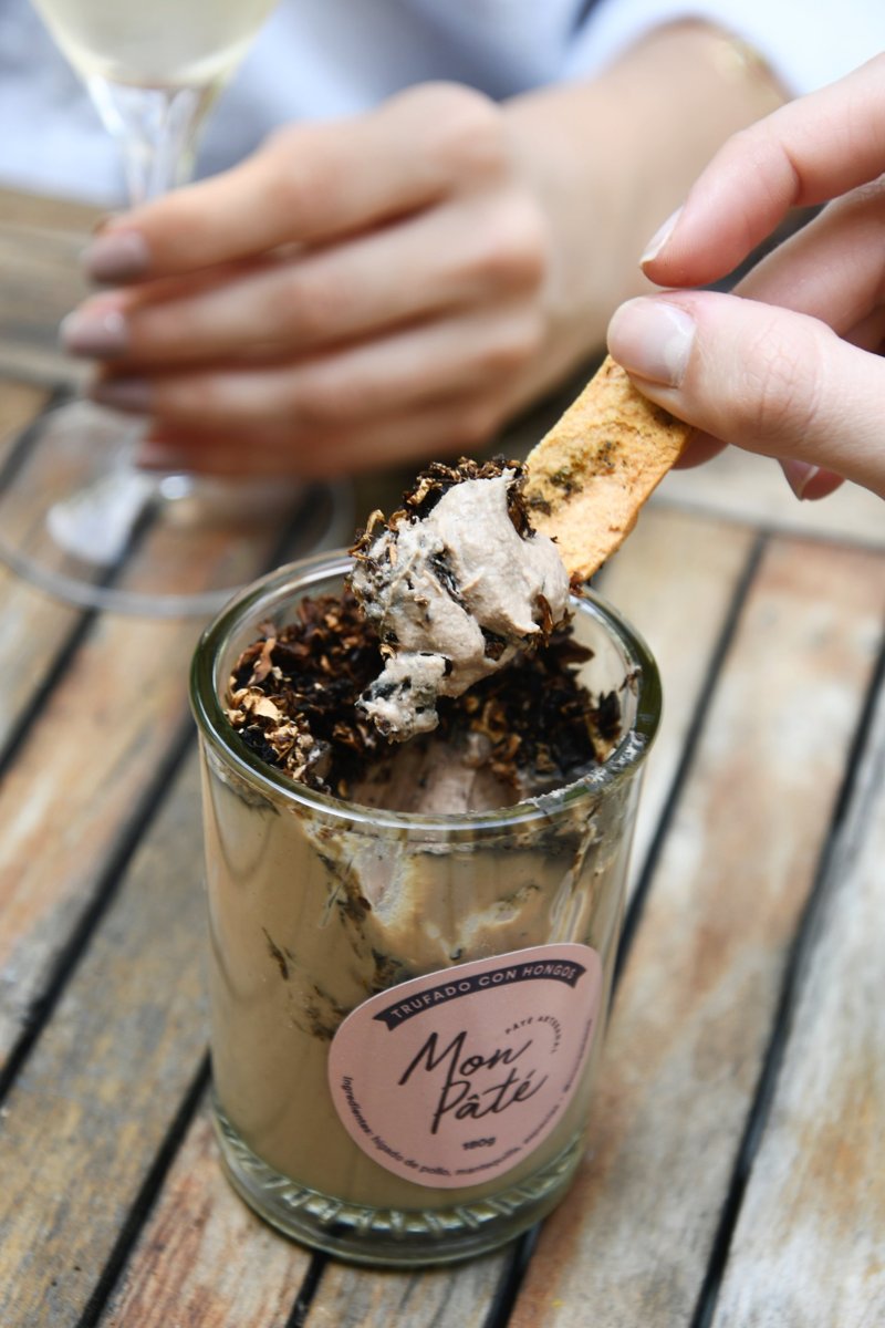 Cracker spreading truffle pâté